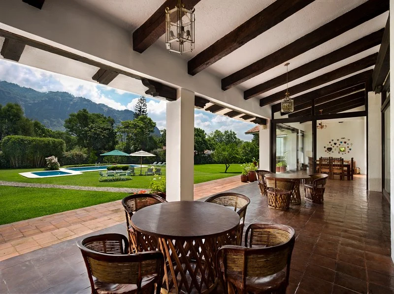 Tandava covered veranda and gardens